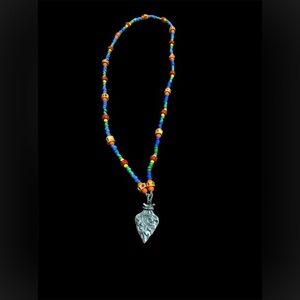 COLORFUL BEADED NECKLACE W/METAL ARROWHEAD FEATURING THE AMERICAN INDIAN